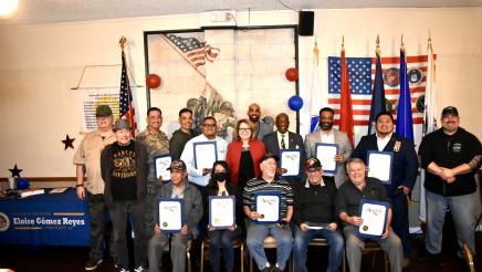 Majority Leader Reyes poses with some of her Veteran of Distinction honorees and representatives from the Fontana American Legion. The honorees are holding their Veteran of Distinction certificate