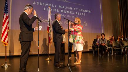 Majority Leader Reyes is sworn in by Attorney General Rob Bonta
