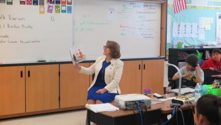 Assemblymember Reyes reads to students