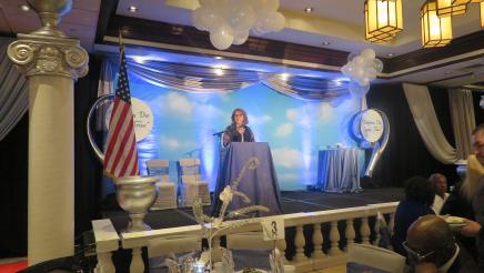 Assemblymember Eloise Reyes speaking at the Gala