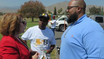Assemblymember with community member