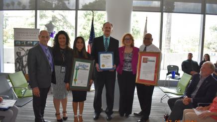 Assembly Member Eloise Gomez Reyes with graduates of Treatment Court
